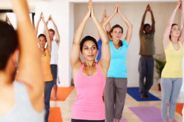 The Benefits of Yoga for Workplace Wellness & Stress Relief 
